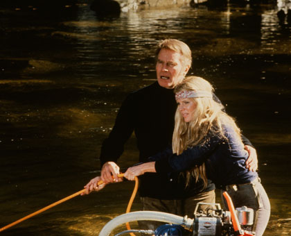 Charlton Heston and Kim Basinger