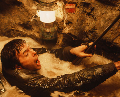 Jean Dupre (Nick Mancuso) caught in a flooding mine.