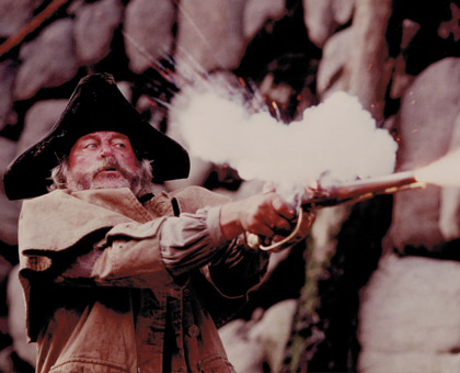 Oliver Reed as “Billy Bones”