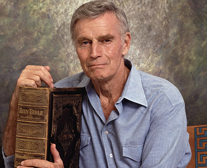 Charlton Heston and Bible from Charlton Heston Presents The Bible